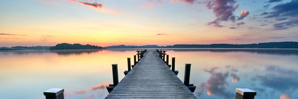 Seehotel Rust Sonnenuntergang Steg